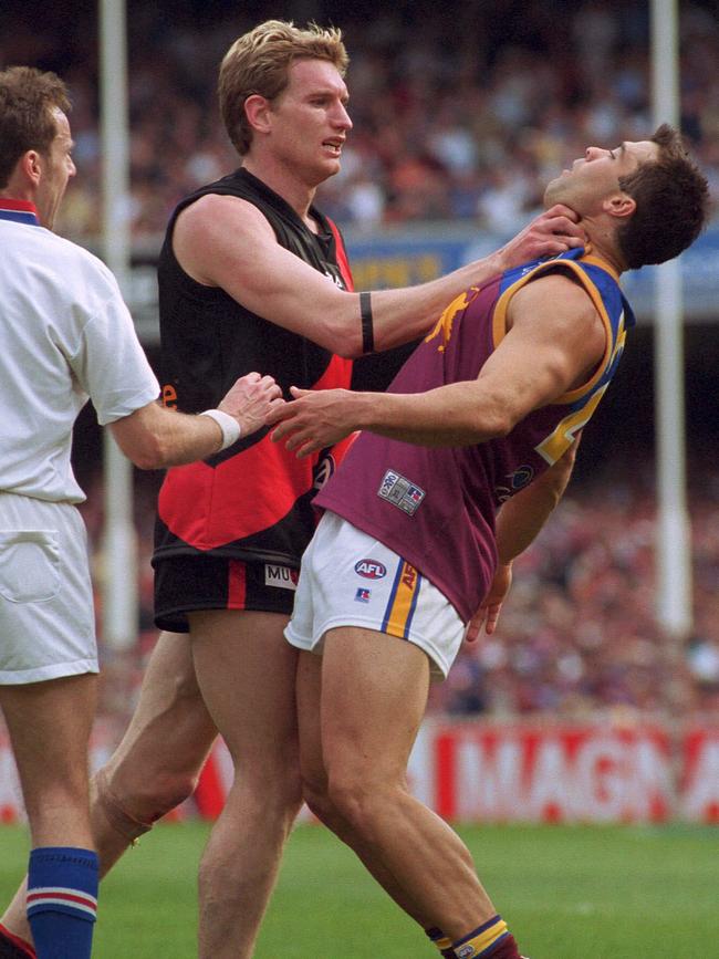 James Hird and Chris Scott get to know each other in the 2001 Grand Final.