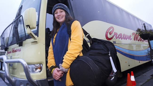 Waratah resident Natalie Deacon, 14, boards a bus for the airport Gold Coast bound. Picture: Chris Kidd.