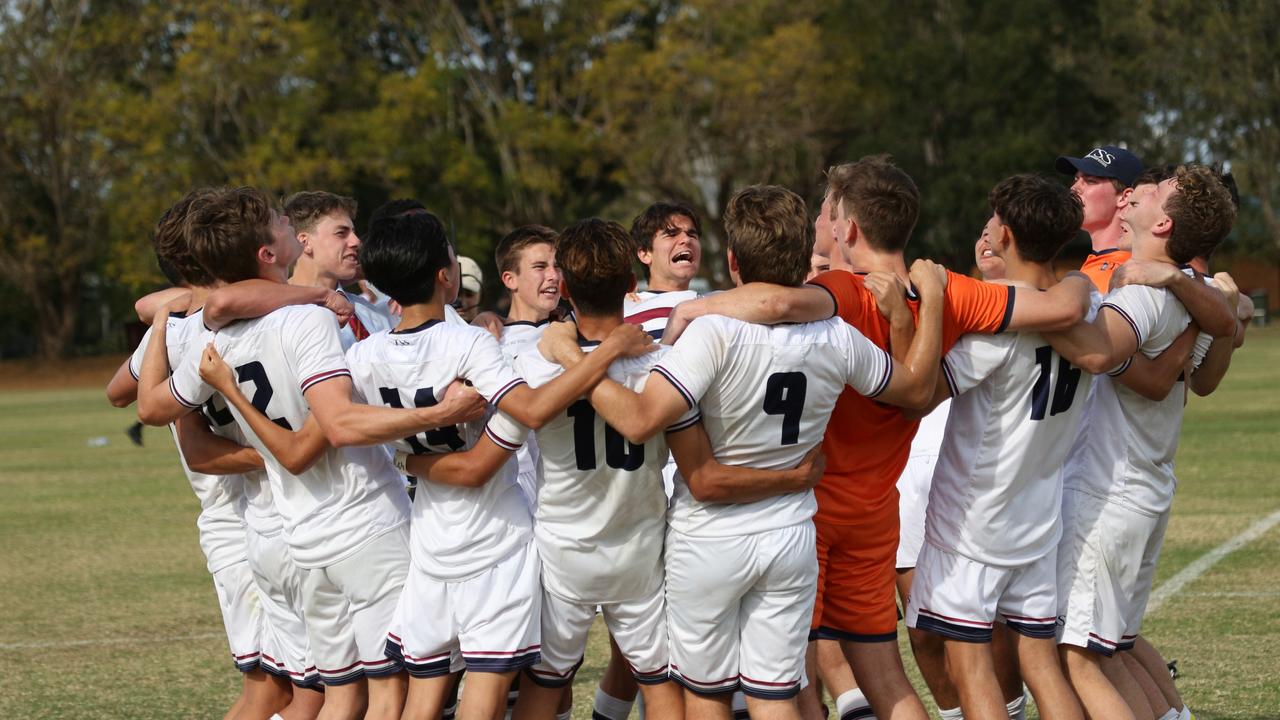 The Southport School celebrates after its 2020 GPS First XI football premiership win against St Joseph's Gregory Terrace. Picture: TSS