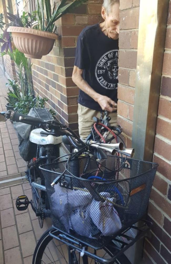 Paul Murphy chaining up his bike at his old Redfern flat before moving out to Clemton Park in southwest Sydney. Picture: Candy Sutton