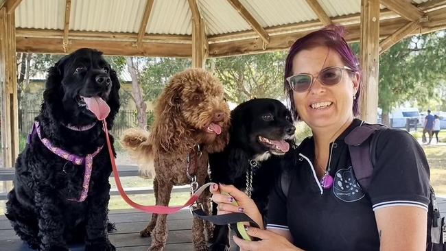 Ms Melrose, Director of Doggie Dates NSW pictured with client's dogs