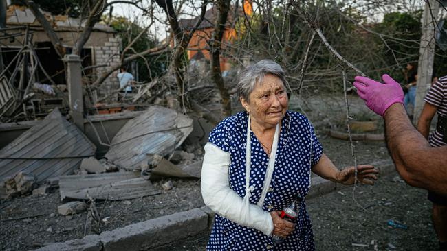 An injured woman after a missile strike in Mykolaiv. Picture: AFP