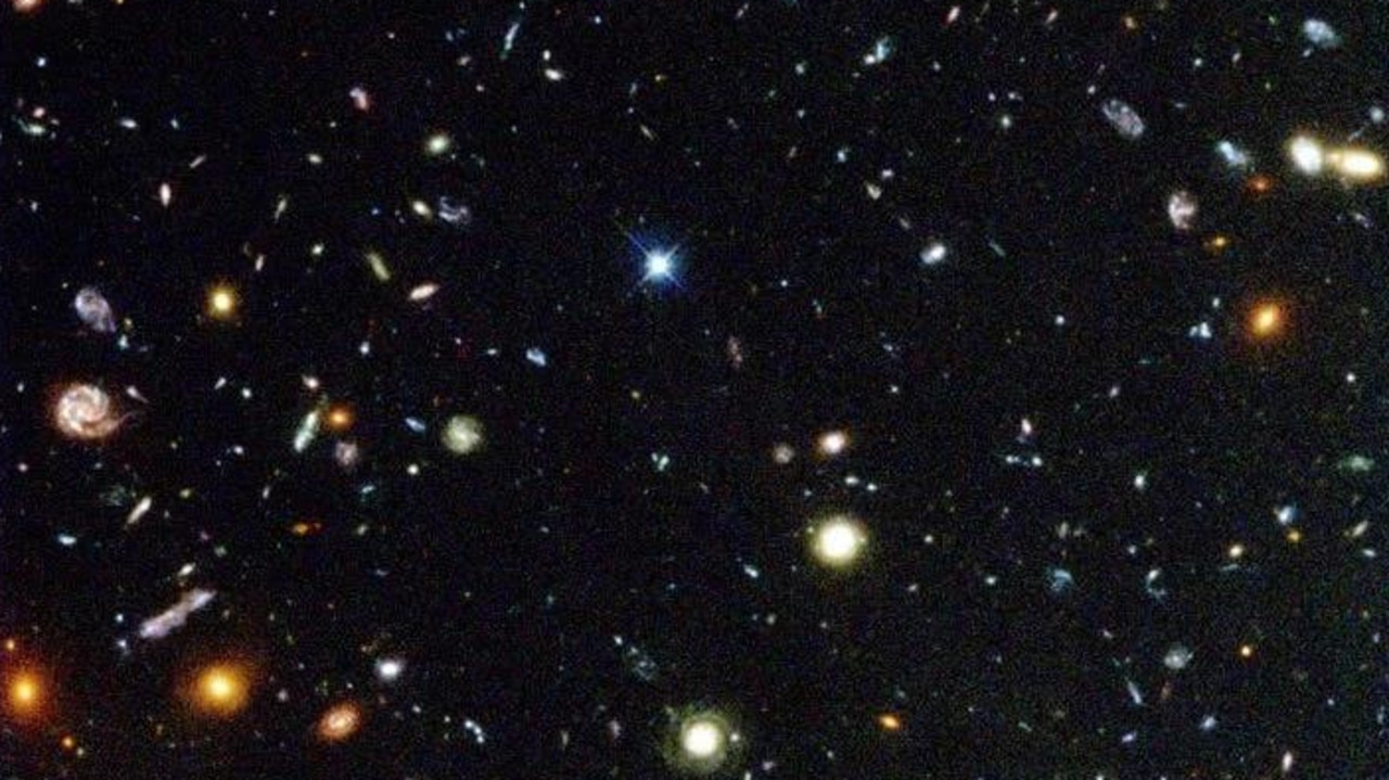 SphereX will work alongside Nasa's Hubble telescope, which is also exploring the origins of the universe. This image snapped by Hubble is the first significant look back to the era of the universe when early galaxies were forming Credit: NASA