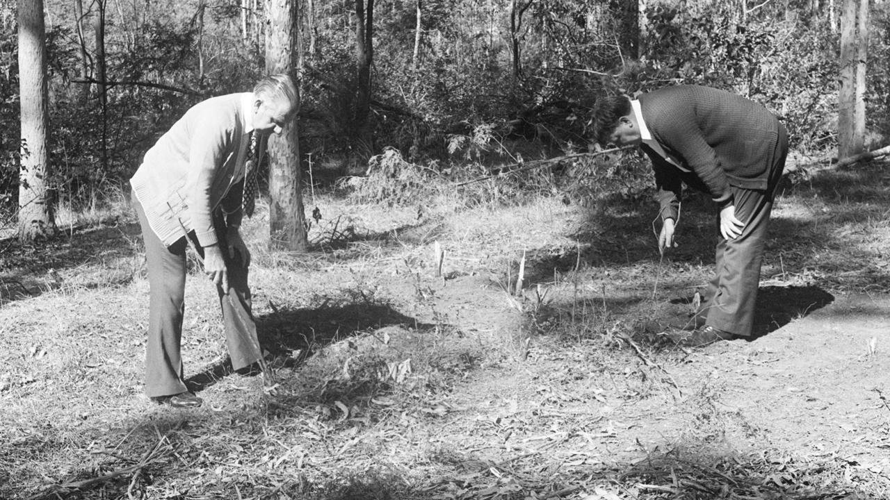 Homicide detectives search in the Murphys Creek area following the murder of two Sydney nurses Lorraine Wilson and Wendy Evans in 1974.