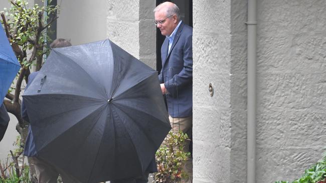 Scott Morrison leaves Kirribilli House with his family on the morning after his defeat by Labor's Anthony Albanese. Picture: NCA NewsWire / Simon Bullard