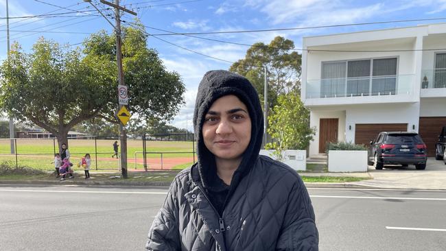 Alia Shahzadi returned home from dinner with friends when they heard the shots last night. She was terrified. The home seen behind her was shot last night. Picture: Paul Brescia