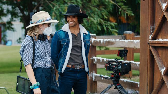 Director Rhiannon Bannenberg and actor Jordi Webber the Mistletoe Ranch set. Picture: David Fell.