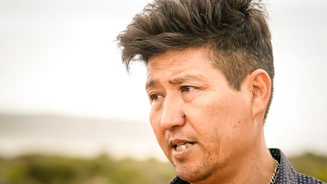 Arash’s distraught father Charman Yari has been camped out with his family at Parsons Beach. Picture: AAP/MIKE BURTON