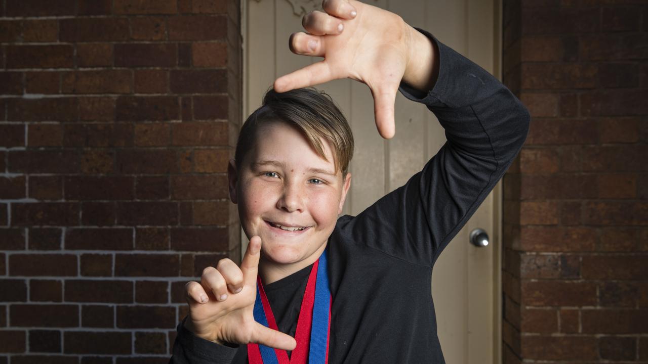 Harry Ryan shows his medals after competing in speech and drama sections of the 77th City of Toowoomba Eisteddfod at Empire Theatre. Picture: Kevin Farmer