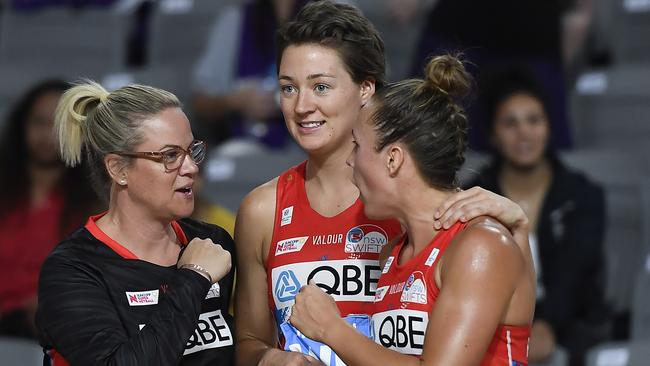 NSW Swifts head coach Briony Akle with Lauren Moore and Paige Hadley.