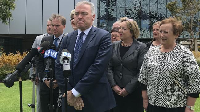 Health Minister Stephen Wade at the RAH, flanked by nine of the 10 Local Health Network chief executives responding to the ICAC report into SA Health. Picture: Brad Crouch