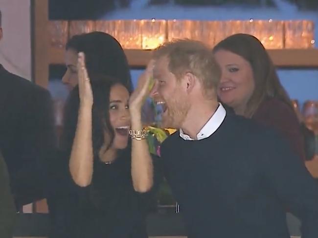 Prince Harry and Meghan Markle celebrated in a VIP box. Picture: Supplied