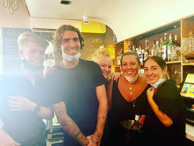 Staff at the "last drinks" at the Narrabeen RSL Club on February 6, 2022 before it closed its doors and went into Voluntary Administration a month later. Picture: Narrabeen RSL Club