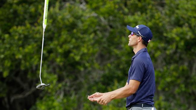 Adam Scott is not happy with his putter.