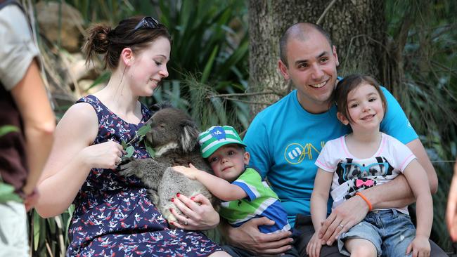 Chris and Gemma Randle with children Maddie 3 and Oliver 1  cuddling a koala at Gorge Wildlife Park, Cudlee Creek . They are part of a A BBC TV reality TV show will highlight the benefits of living in the southwest.