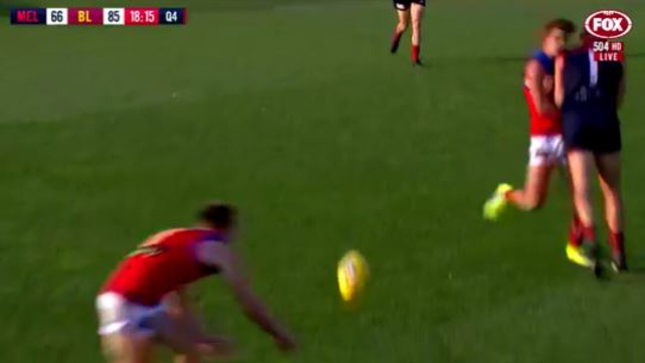 Melbourne's Steven May bumps Brisbane's Jarrod Berry.