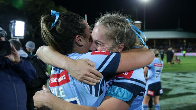 Burleigh’s Millie Boyle celebrates the NSW victory with Kezie Apps. Picture: Jonathan Ng