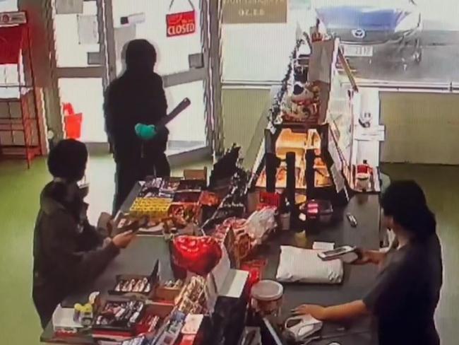 WATCH: Moment man wielding machete hacks through store