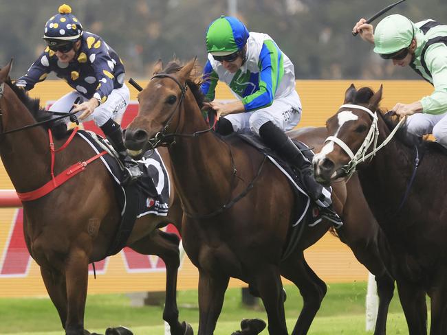 SYDNEY, AUSTRALIA - DECEMBER 04: Hugh Bowman on Waihaha Falls wins race 8 the Dooleys Handicap during Sydney Racing at Rosehill Gardens on December 04, 2021 in Sydney, Australia. (Photo by Mark Evans/Getty Images)
