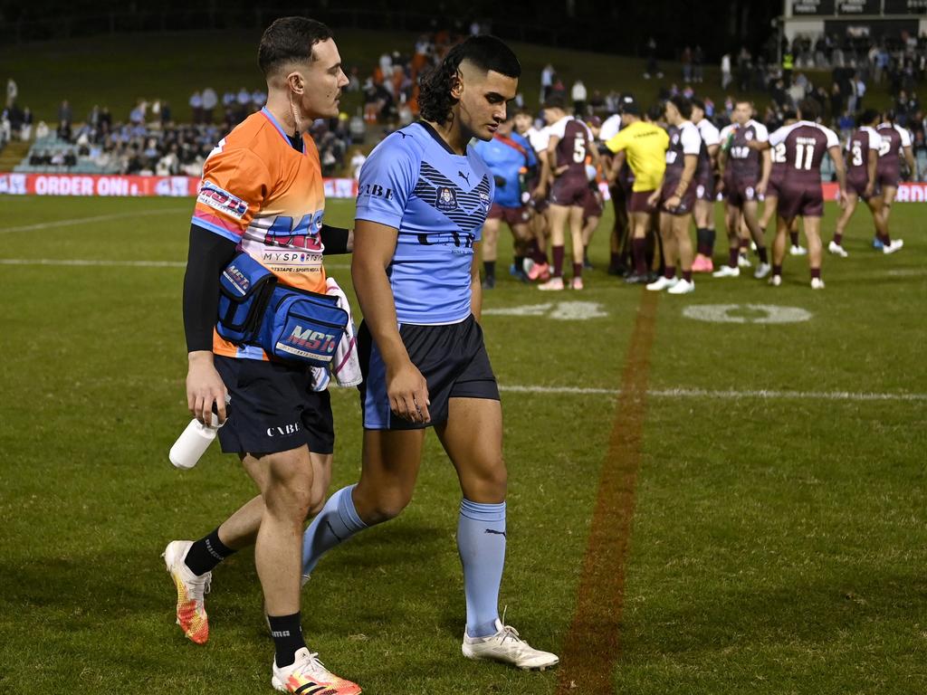 Jesse McLean leaves the field for a HIA after a brutal head knock. Picture: NRL Photos/Gregg Porteous