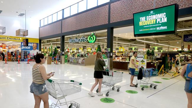 People queuing at Woolworths at West Torrens in Adelaide ahead of the snap six-day lockdown. Picture: Kelly Barnes/Getty Images