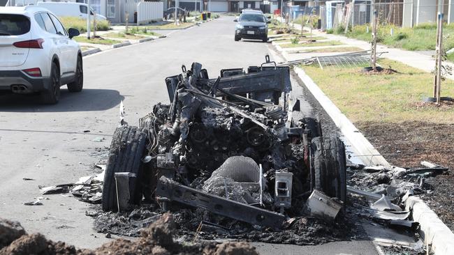 Police are probing whether a burnt-out car dumped in Beveridge is linked to the shooting. Picture: David Crosling