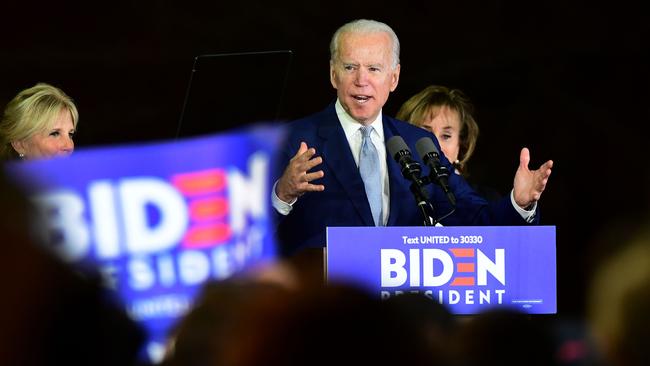 Democratic presidential hopeful former vice president Joe Biden flanked by with his wife Jill, left, and sister Valerie Biden Owens. Picture: AFP