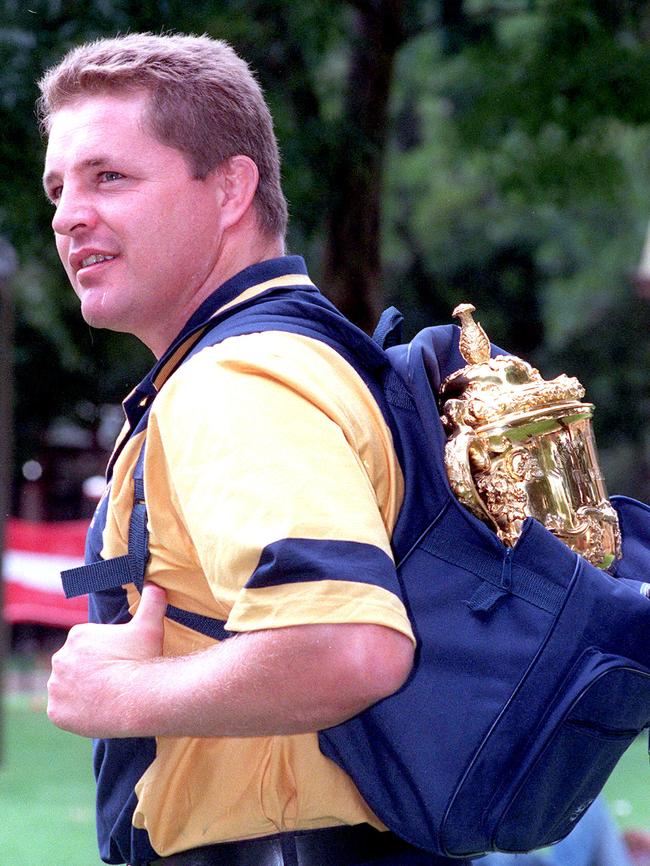 Wallabies prop Andrew Blades prepares for a tour of the trophy in 2000.