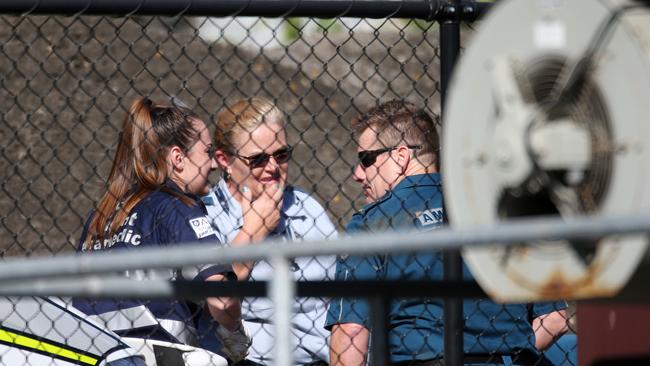 Paramedics on the day of the tragedy. Picture: NIGEL HALLETT