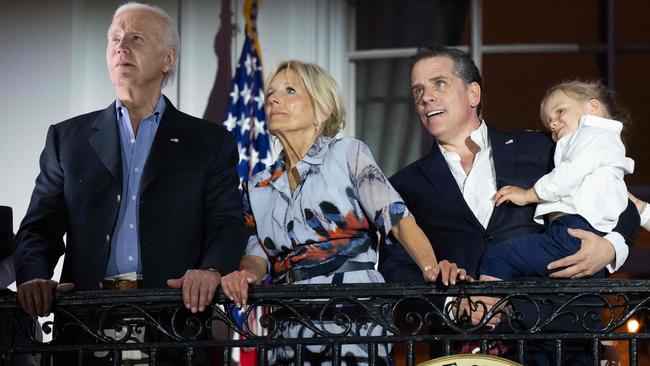 Joe Biden, First Lady Jill Biden and Hunter Biden with son Beau watch the Independence Day fireworks from the White House on July 4. Picture: AFP