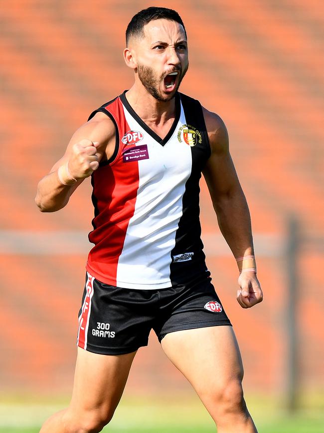 Ahmed Hamdan of West Coburg celebrates kicking a goal. (Photo by Josh Chadwick)