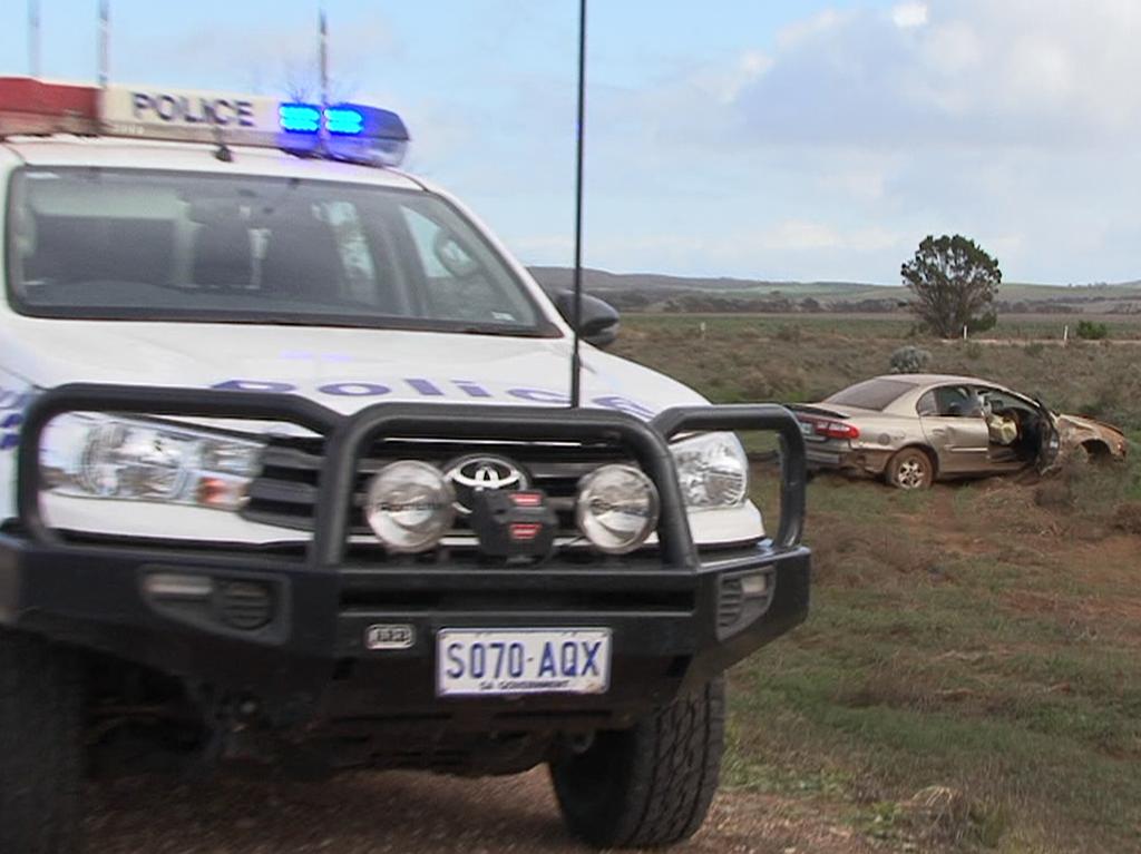 Police at the scene of the fatal crash. Picture: Ron Campbell