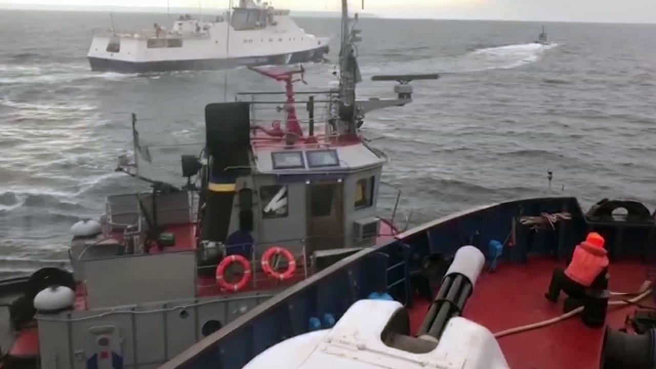 A Russian Coast Guard video purporting to show the moment a Russian ship rammed a Ukrainian tugboat, in the Kerch Strait on Sunday. Picture: AP.