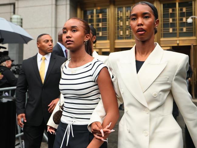 Chance Combs and D’Lila Star Combs, the daughters of Sean Combs, leave court. Picture: Getty Images
