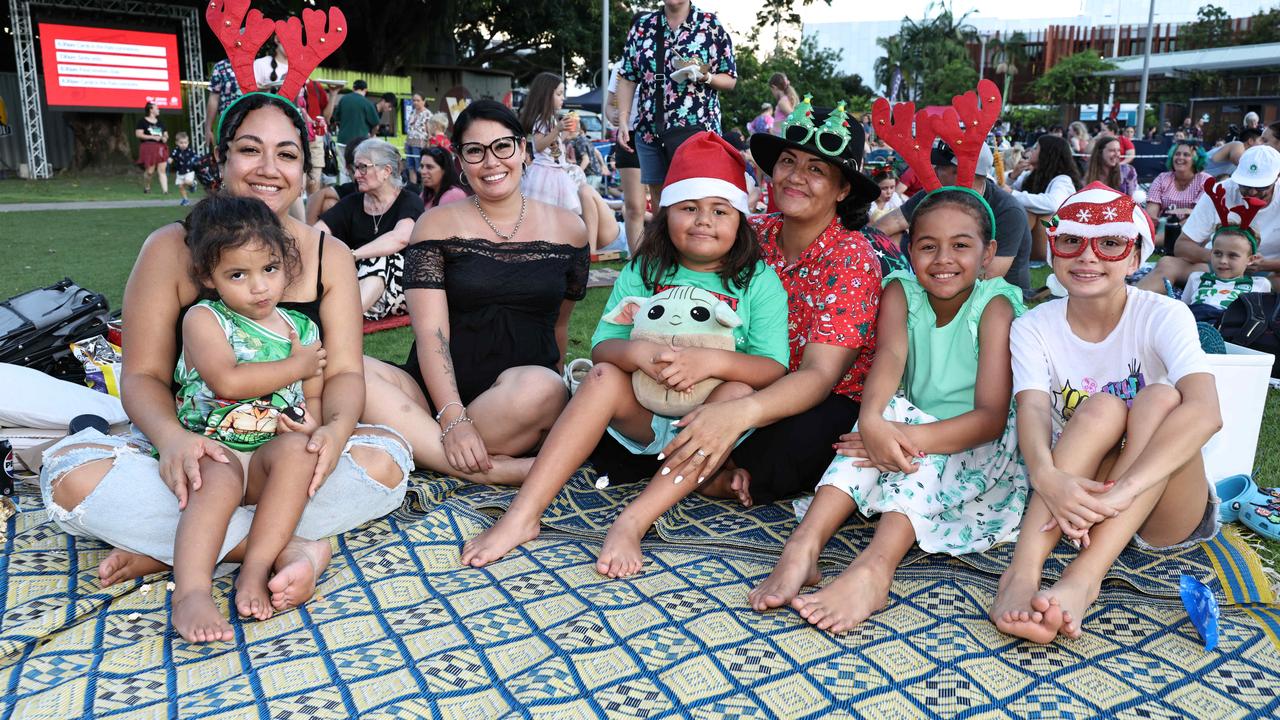 Tempestt Ngatai, Tatum Ngatai, 2, Narelle Lack, Jahvaarn Craig, 6, Anya Craig, Jazminn Craig, 9, and Talei Ngatai, 10, at the Carols in the Park, held at Munro Martin Parklands. Picture: Brendan Radke