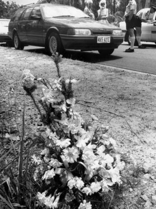 Flowers left at the scene by Colin Woodhouse’s wife