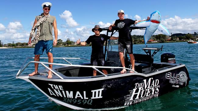 The Mad Hueys Sean Harrington, Joel Scott and Damon Nicholls in their boat on the Tweed. Picture: Tim Marsden