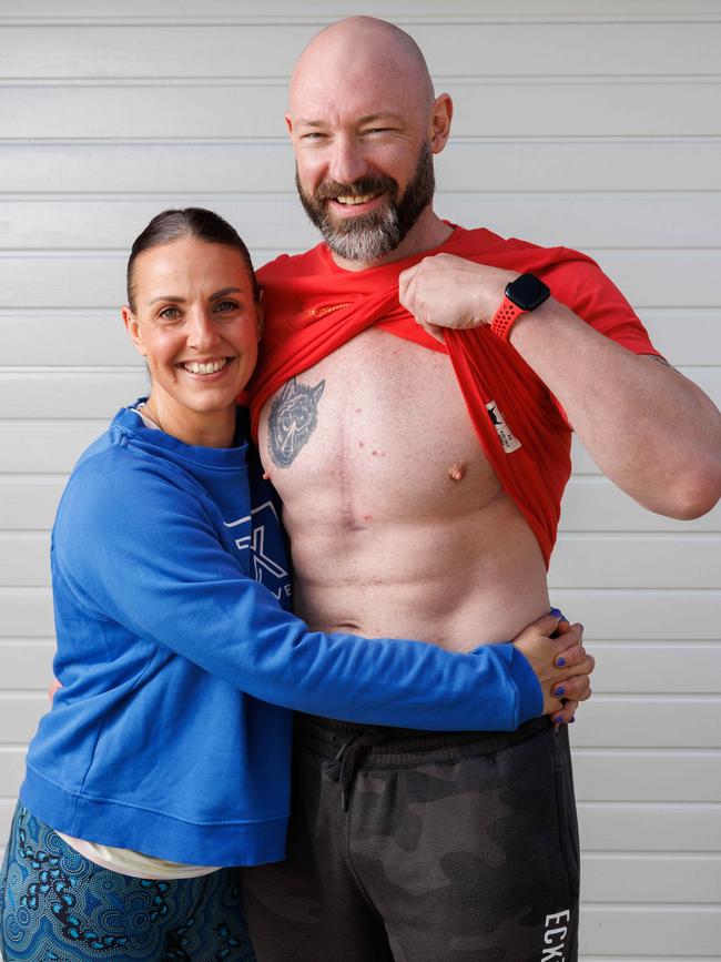 Fitness fanatic Rob Hodgson, pictured with wife Amanda, needed a heart transplant in 2022, two years after he caught Covid on a work trip to the USA. Picture: David Swift