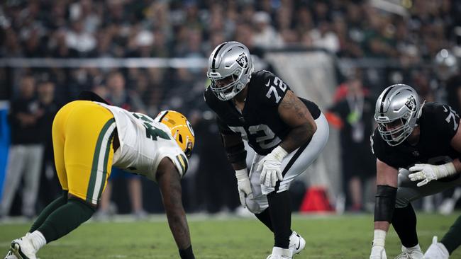 Las Vegas Raiders guard Jermaine Eluemunor (C) says the hip drop tackle isn’t a major issue in the NFL. Picture: Las Vegas Raiders