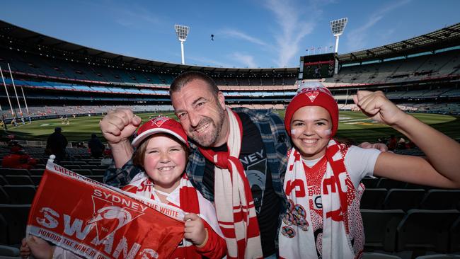 Sydney Swans fans at the MCG Zane, 10, Blake, and Hayley, 13. Picture: NewsWire/Nadir Kinani