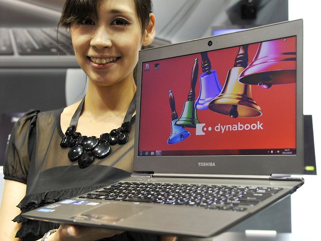 <p>A model displays Japanese electronics company Toshiba's ultra slim notebook PC called the "Dynabook R631" equipped with an Intel's i5 processor and a 13.3-inch LCD display and 15.9mm thick body, weighing 1.12kg. Toshiba will put it on the market this month.</p> <p>Picture: AFP</p>