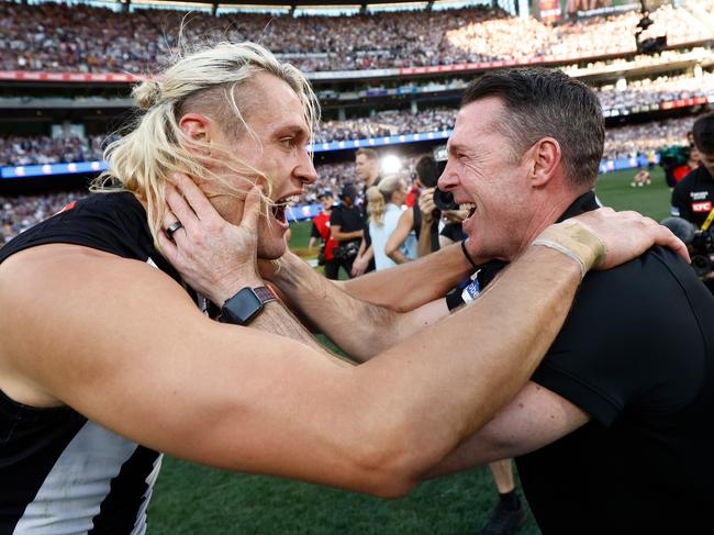 Moore and coach Craig McRae after the final siren. Picture: Michael Willson/AFL Photos