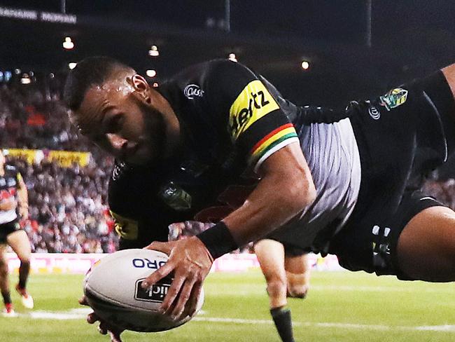 Penrith's Tyrone Phillips scores a try during NRL match between the Penrith Panthers and Wests Tigers at Penrith Stadium. Picture. Phil Hillyard