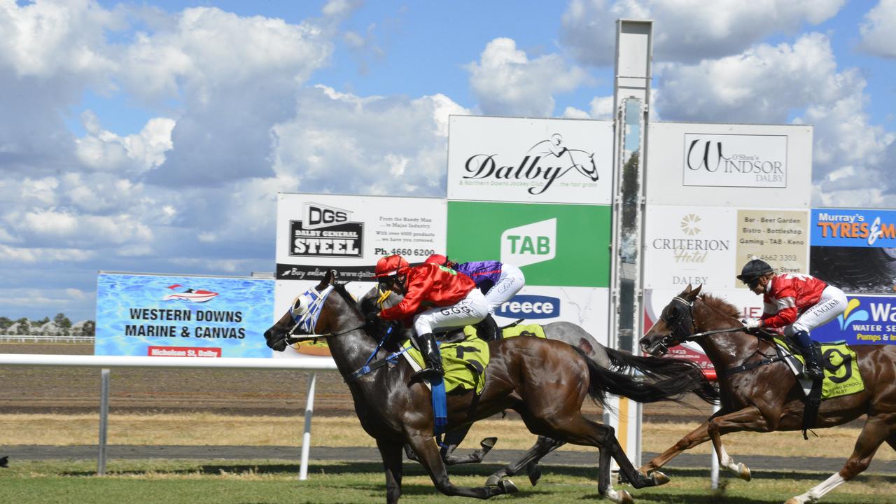 Bobbie Jo and jockey Gary Geran arrive on the outside to win today's Three-Year-Old Maiden Handicap at Bunya Park. Picutre: Glen McCullough