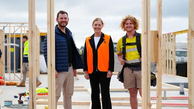 Housing minister Felix Ellis with Vonette Mead, Master Builders Tasmania, and Ryan from JDR Homes after announcing further funds for the house building sector. Picture: Supplied