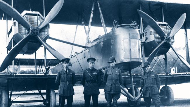 Sir Keith and Sir Ross Smith with Wally Shiers in front of Vickers Vimy aircraft at Hounslow before their historic flight to Australia.