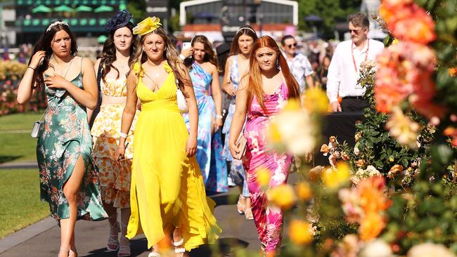 Crowds flood into Flemington. Picture: Mark Stewart