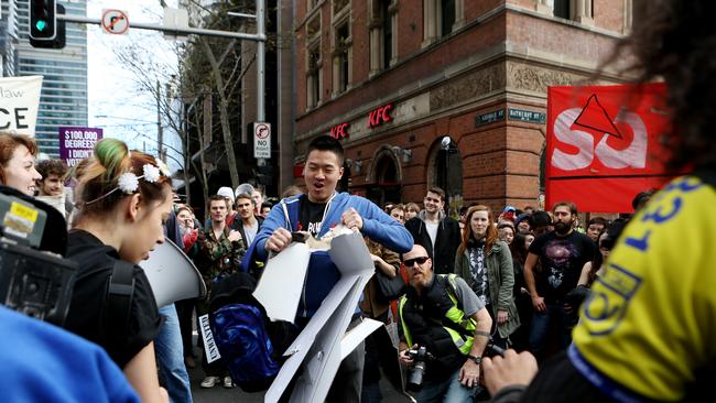 Students tear apart an effigy of Christopher Pyne in 2014. Picture: AAP Image