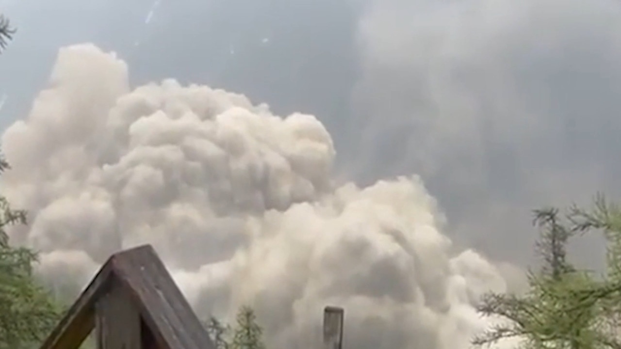 Terrifying moment glacier buries village as it crashes down Swiss mountain