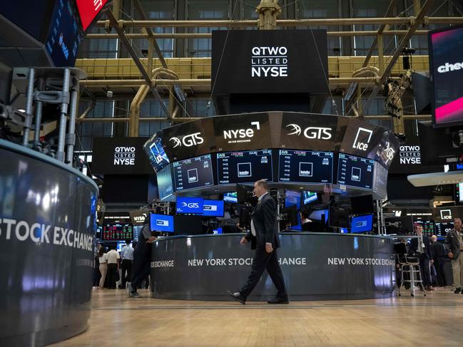 Traders work the floor of the New York Stock Exchange on August 16, 2024. US stocks edged lower in early trading Friday, as traders looked to lock in gains at the end of a positive week for major Wall Street indices. Around 10 minutes into trading, the Dow Jones Industrial Average was down 0.1 percent at 40,518.87, and the S&P was 0.1 percent lower at 5,536.08. The Nasdaq slipped 0.2 percent to 17,566.08. (Photo by ANGELA WEISS / AFP)